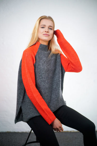 Womens grey and orange jumper with relaxed fit and grey body and orange sleeves