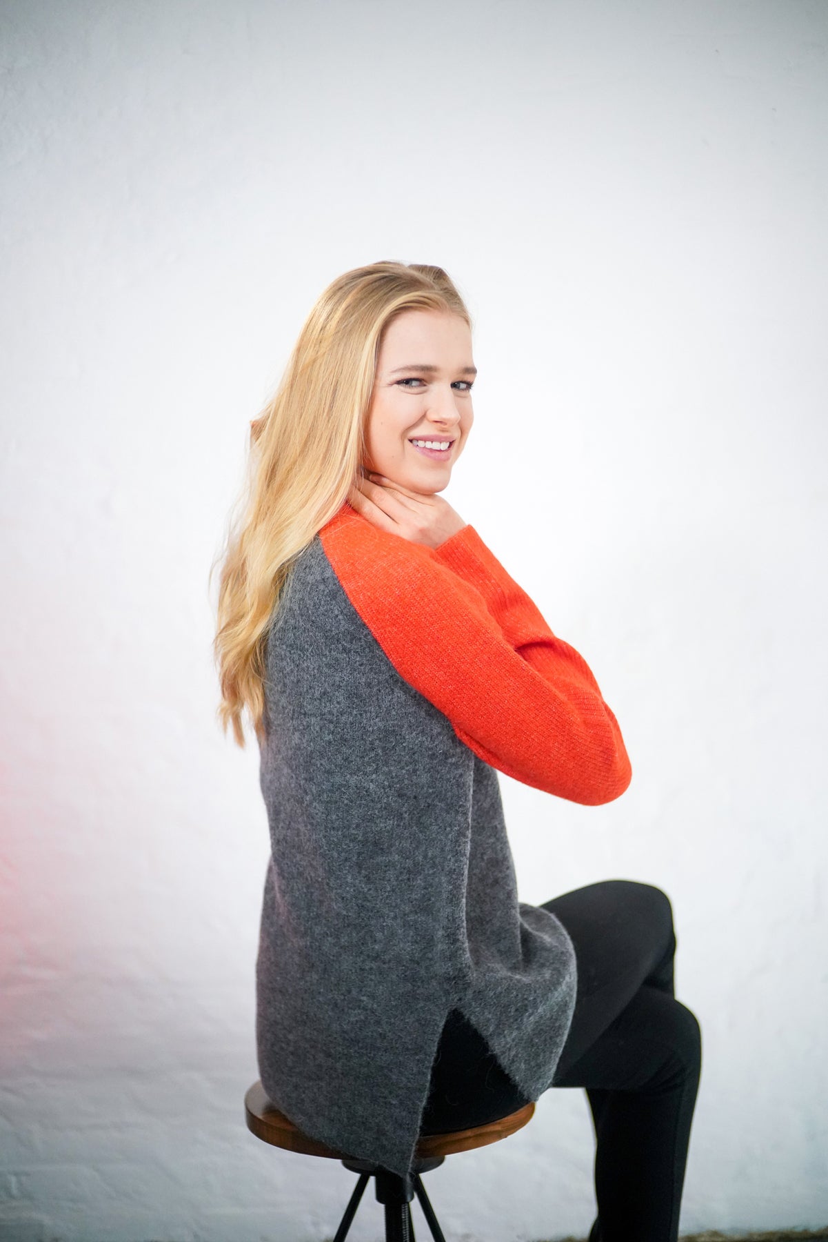 Womens grey and orange jumper with relaxed fit and grey body and orange sleeves