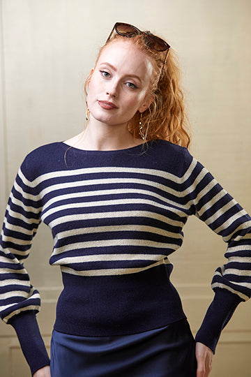 Breton stripe jumper in navy and cream wool and cashmere blend. Flattering waist detail and puff sleeves.