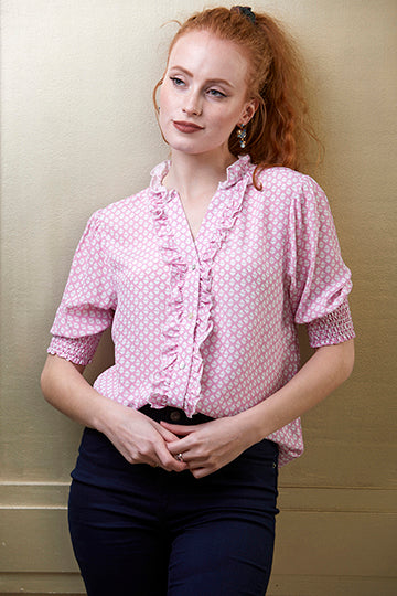 Women's short sleeved pink summer shirt with white heart print