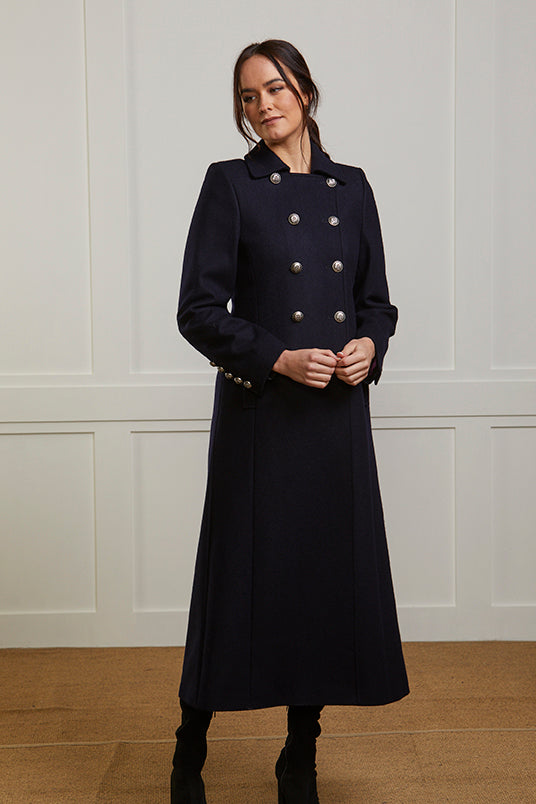Women's long navy coat in pure wool with double breasted front, longline fit and military styling