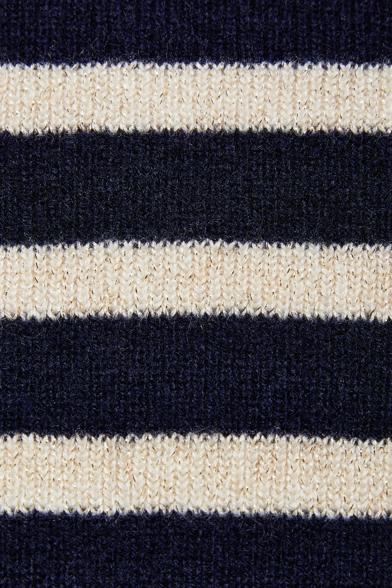 Breton stripe jumper in navy and cream wool and cashmere blend. Flattering waist detail and puff sleeves.