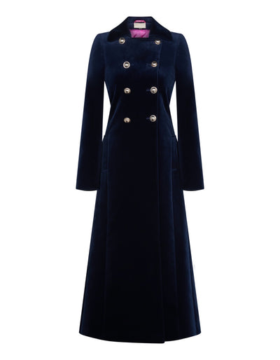 Women's long navy velvet coat with military style silver buttons.